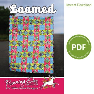 May include: A quilt featuring a grid pattern of light blue squares and diamond-shaped blocks in vibrant pink, green, and multi-colored floral prints. The text "Loomed" appears at the top, with a green circular PDF icon and "Running Doe Quilts" below.