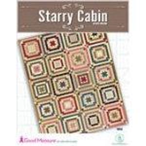May include: A handmade quilt with a patchwork design featuring squares in various colors, including beige, pink, and brown. The quilt has a "Starry Cabin" pattern, with the text displayed at the top. The quilt is made with Good Measure fabric.
