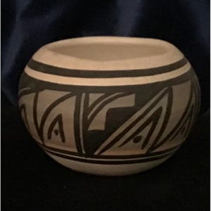 Handcrafted Navajo Mini Pot Signed N.M. Navaho 84 With Traditional Black Geometric Design On Beige Clay