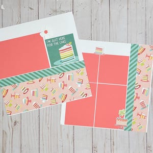 May include: Two scrapbook pages with a birthday theme. One page has a coral-colored background with a green and white striped border and a patterned paper with cake slices. The other page has a similar design with the text "I'M JUST HERE FOR THE CAKE".