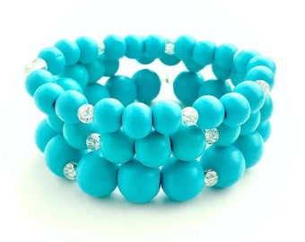 Conjunto de pulseras con cuentas de madera de color azul turquesa claro