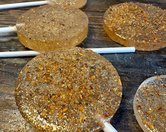 Chupetes de piruleta de caramelo duro con infusión de Tajin Una docena de caramelos mexicanos dulces y picantes