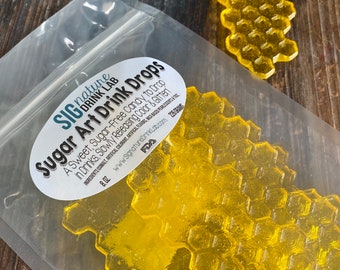Honey Comb Sugar Art Drops™ Hard Candy Adds Fun to Drinks, Cake Toppers & More