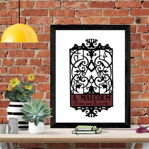 May include: Black and white print of an ornate iron gate with the text "A. MALCOLM Printer and Bookseller" in a red rectangle at the bottom.