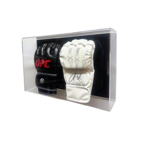 May include: A clear acrylic display case with two pairs of boxing gloves. One pair is black with red UFC lettering and the other pair is white with a skeleton design. The white gloves are signed "DV".