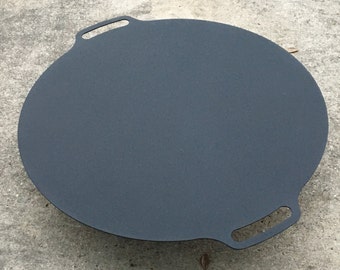 3/16" thick aluminum 51.5" diameter fire pit lid. Round Fire Pit lid. Integral handles keep the top clean and flat for a coffee table look.