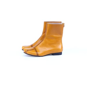 Stivali piatti in pelle larghi stivaletti da donna