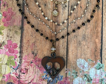 Peace Heart Necklace> Beaded Necklace. Black Ivory. Peace Sign Jewelry. Heart Jewelry. Peace Necklace. Heart Necklace. Boho Style. Sundance