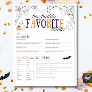 May include: A white paper questionnaire titled Boo Buddy Favorite Things with black spiderweb borders, two ghost illustrations, and a bat graphic. The form includes sections for All About Me, This or That, and Just For Fun with blank lines for writing.