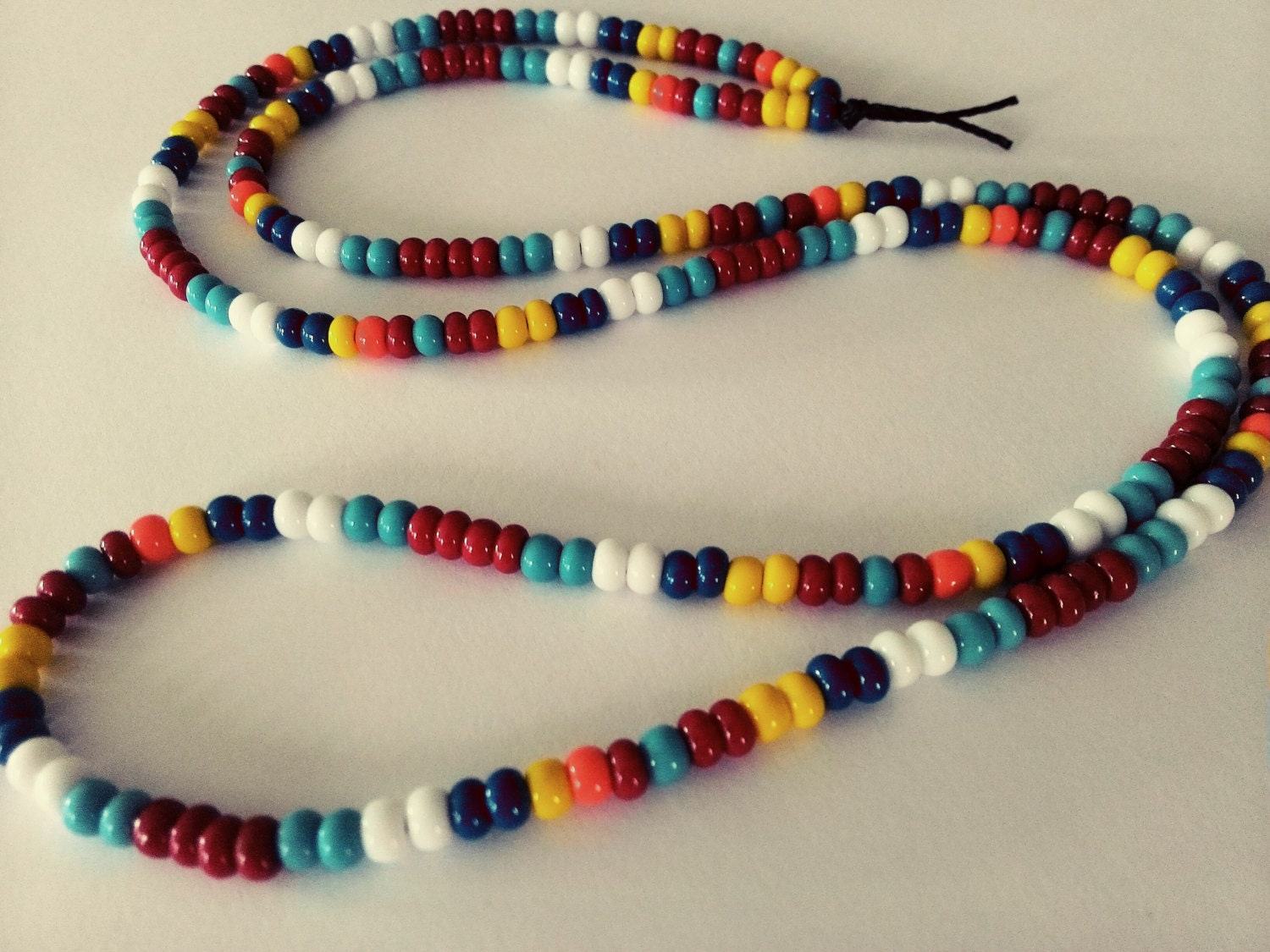 Amazon.com: Rainbow seed bead necklace with silver plated love link. Pride  jewelry. : Handmade Products