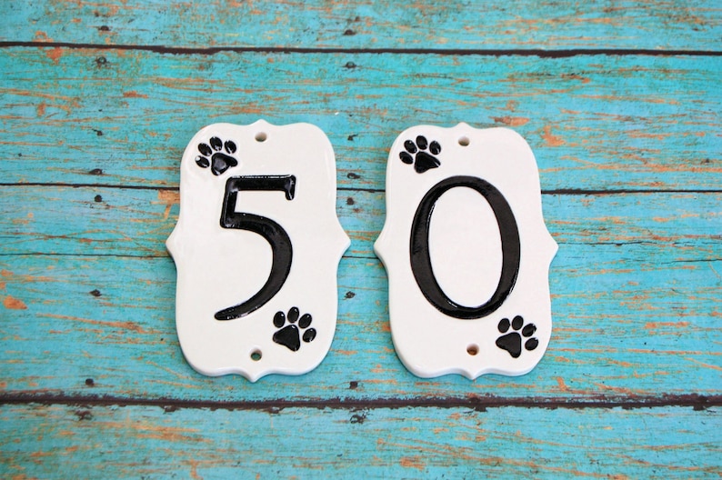 handmade ceramic paw print house numbers paw house numbers
