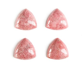 May include: Four triangular pink gemstone cabochons, each with a unique pattern of white and pink swirls, are arranged in a grid pattern on a white background.