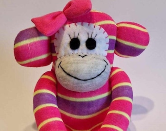 Bright Pink Sock Monkey striped, with bow,  Stuffed Animal, Sock toy, gift. Handmade by Sockadoo