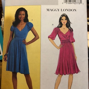 May include: A sewing pattern for a dress, featuring two different styles. The pattern is from Butterick and is for sizes 16-18-20-22. The dress on the left is blue and the dress on the right is pink.