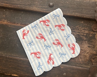 Red Lobster with Blue Bows on a blue and white stripes background Cocktail Paper Napkin.  Please read item description.