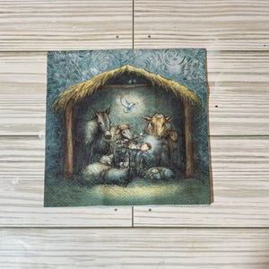 May include: A vintage-style illustration of a nativity scene with a donkey, a cow, sheep, and a baby in a manger. The scene is set in a barn with a straw roof and a blue sky with stars.