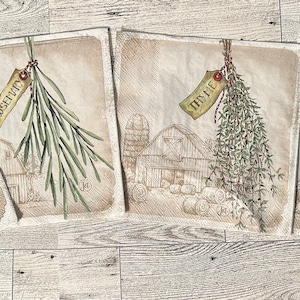 May include: Four vintage-style prints of herbs, each with a different herb and its name: Basil, Rosemary, Thyme, and Sage. The prints are on a light brown background with a rustic farmhouse design.