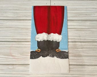 Servilleta de papel para invitados con piernas y botas de Papá Noel