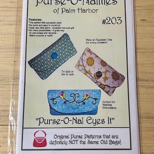 May include: A pattern for eyeglass cases, titled "Purse-O-Nalities of Palm Harbor." The design features three sample cases with different patterns and the text "Purse-O-Nal Eyes It." The pattern includes instructions for quilting and machine embroidery.