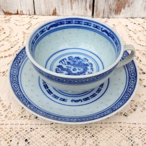 Chinese Tea Cup Rice Grain, JingDeZhen Cup and Saucer Dragon Motif White and Blue