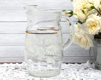 Antique Glass Pitcher with White Flowers