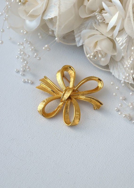 MONET Bow Pin, Fancy Bow Brooch Brushed Gold Plate