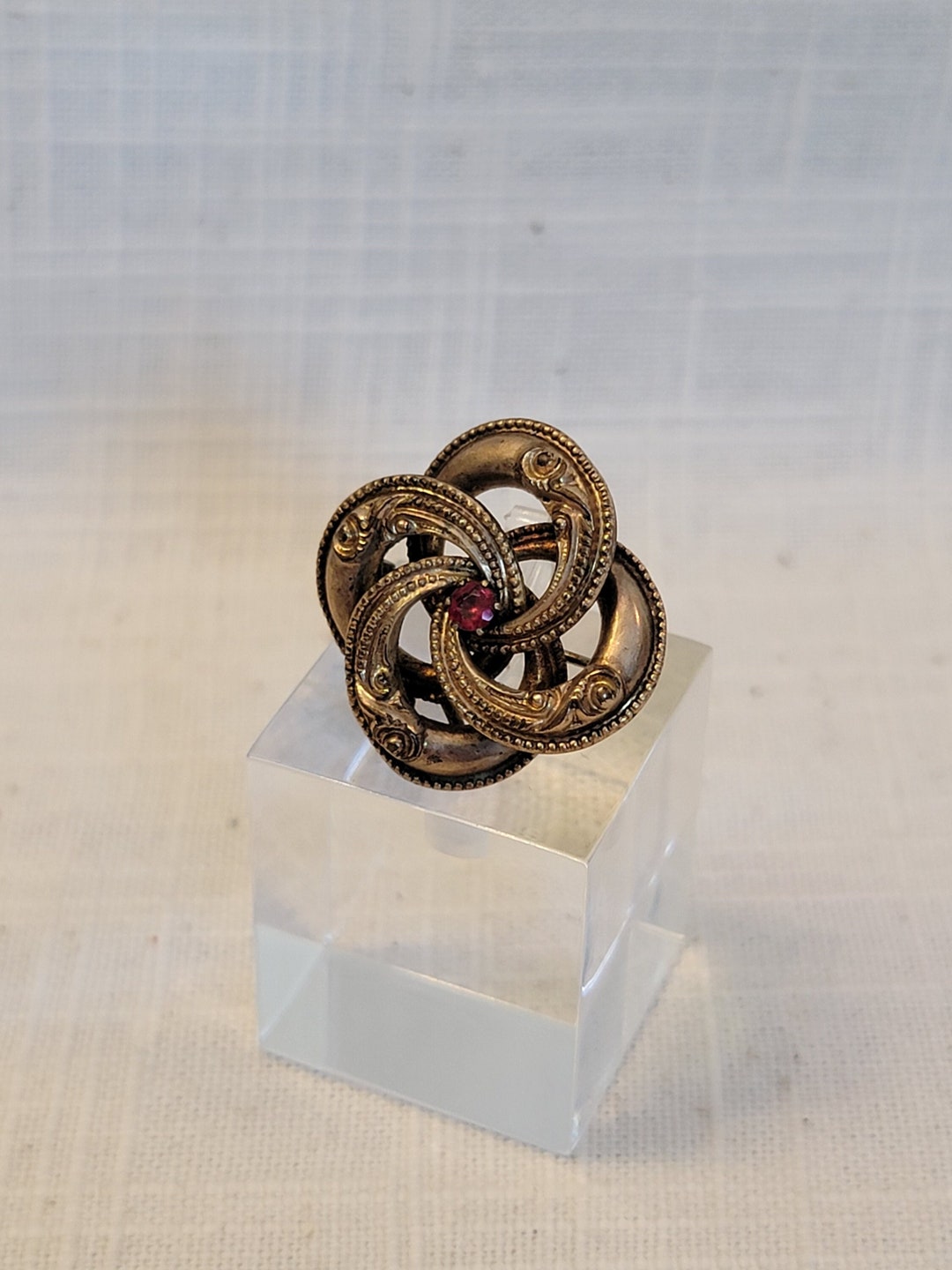 Victorian Brooch and watch fob with red setting