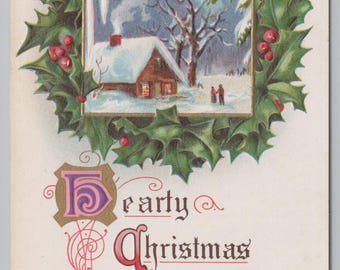 Antique Embossed Christmas Postcard Hearty Greetings Winter Snow Cottage Cabin House Holly Wreath 1910s Holiday Ephemera