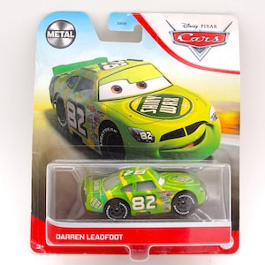 May include: A die-cast metal toy car of the character Darren Leadfoot from the Disney Pixar Cars movie. The car is primarily lime green with yellow and black accents, featuring the number 82. The packaging includes the Disney Pixar Cars logo.