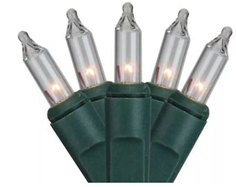 May include: Close-up of a cluster of five clear mini Christmas lights with a warm glow. The bulbs are set in a dark green base, creating a festive and decorative display. Perfect for holiday decorating.