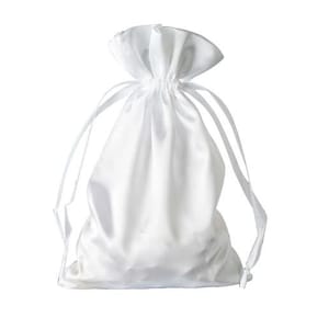 May include: A white satin drawstring bag. The bag is made of soft, silky fabric and has a simple, elegant design.