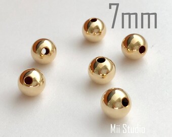 6 Stück 7 mm 14k gelb gold filled runde nahtlose Perlen Spacer S07g