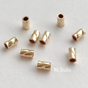 30 pezzi 50 pezzi 14k riempito oro 3 x 2 mm ritorto crimpatura tubo distanziatore F59g