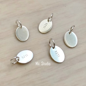 Etichetta di qualità ovale 7,3 mm x 5,5 mm Etichetta di qualità in argento sterling con anello T01s