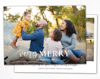May include: A Christmas card template featuring a family of four in a park setting. The card reads "very MERRY" with the family's last name and the year 2019. The text below reads "May all your days be merry & bright" with the family's names.