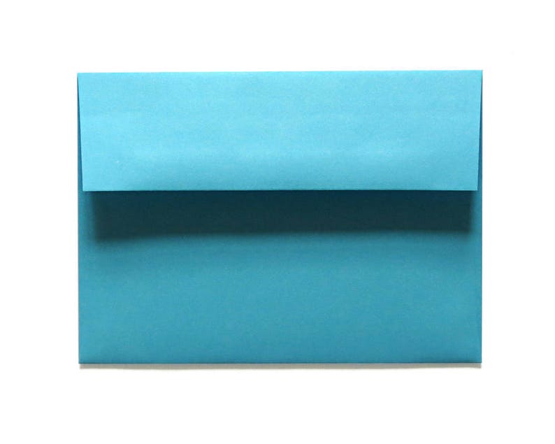 May include: A light blue envelope with a flap.