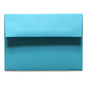 May include: A teal blue envelope with a rectangular shape and a folded flap. The envelope is made of paper and is set against a white background. The envelope is a solid color with no visible text or design.