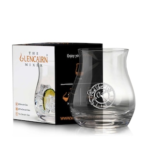 May include: A clear Glencairn Mixer glass with the text "Tick Tock Gin O'Clock" and a clock design. The glass is next to a black and white box with the text "The Glencairn Mixer" and a drawing of the glass with ice and a lime slice.