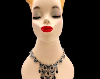 Collana vintage messicana in argento sterling con pendenti in onice, firmata dal designer HOB, massiccia e vistosa.