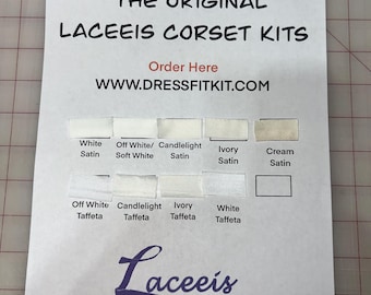 Campioni di colore del tessuto in taffetà satinato: bianco, avorio, crema, bianco sporco