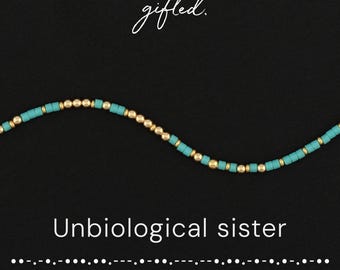 May include: A beaded bracelet featuring alternating turquoise cylindrical beads and small gold spherical beads arranged in a wavy line. The text gifted. appears at the top, and the text Unbiological sister is printed below the bracelet.
