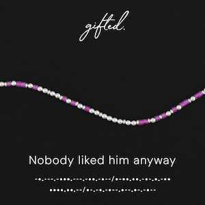 May include: A beaded necklace featuring alternating silver-toned metallic beads and vibrant magenta cylindrical beads. The text gifted. appears at the top, with the phrase Nobody liked him anyway and Morse code printed below the jewelry piece.