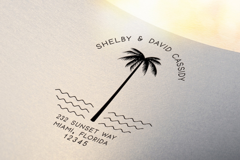 May include: Black and white illustration of a palm tree with the text "Shelby & David Cassidy" and "232 Sunset Way, Miami, Florida 12345" below the tree.