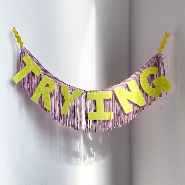Trying FUN CULT Fringe Banner | trying garland, wall hanging banner, fringe wall hanging, office decor, dorm room decor, funny banner
