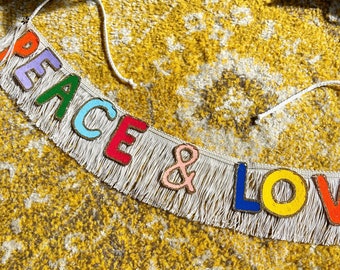 Peace & Love Fringe Banner | fringe wall hanging, wall decor, glitter banner, party banner, peace and love home decor sign