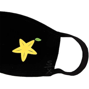 May include: Black face mask with a yellow starfruit design. The starfruit has a green leaf.