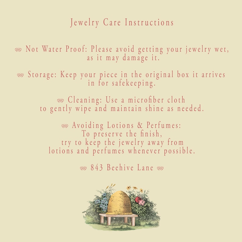 May include: A cream-colored card with jewelry care instructions in red text. The instructions include avoiding water, proper storage, cleaning with a microfiber cloth, and avoiding lotions and perfumes. A decorative illustration of a beehive and flowers is at the bottom.
