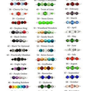 a collection of various colored beads, each with a unique color and shape, arranged in rows and columns. The colors range from red to blue, green to silver, and from black to gold. The beads are organized in a way that allows for easy comparison and identification of the differences between them.