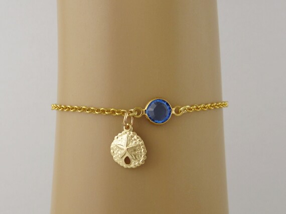 Sand dollar bracelet gold discount