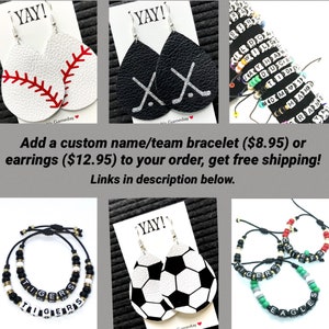 May include: A set of three different custom name/team bracelets and earrings. The bracelets are black and white with the words "TIGERS", "EAGLES", and "CHIEFS" spelled out in black beads. The earrings are leather and feature a baseball, hockey sticks, and a football design. The text "YAY!" is printed on the cards.